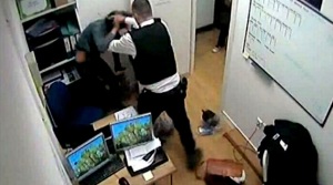 Policeman beats